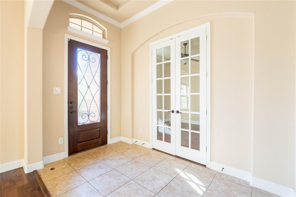 9101 Waters Lane Rowlett, TX 75089 - Photo 5 of 34 a view of an entryway with a window
