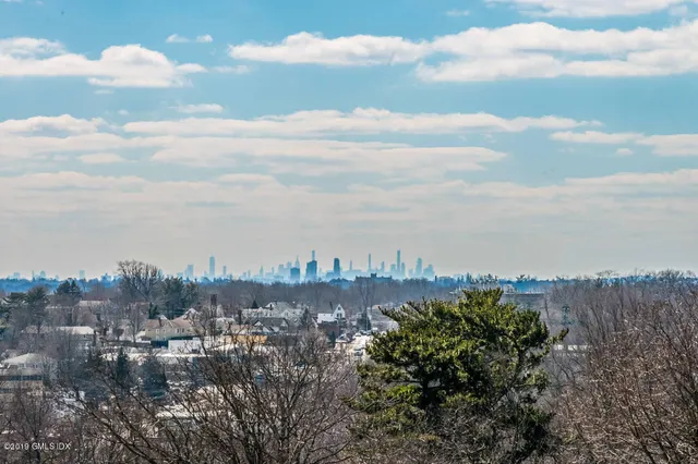 a view of a city and mountain