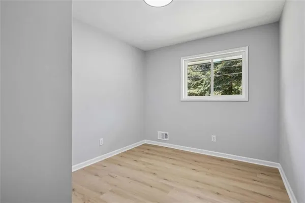 an empty room with a window