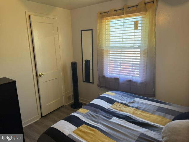 4603 Raleigh Road Temple Hills, MD 20748 - Photo 34 of 40 a bedroom with a bed and a window