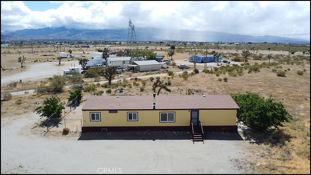 12232 Sheep Creek Road Phelan, CA 92371 - Photo 1 of 45 an aerial view of a house