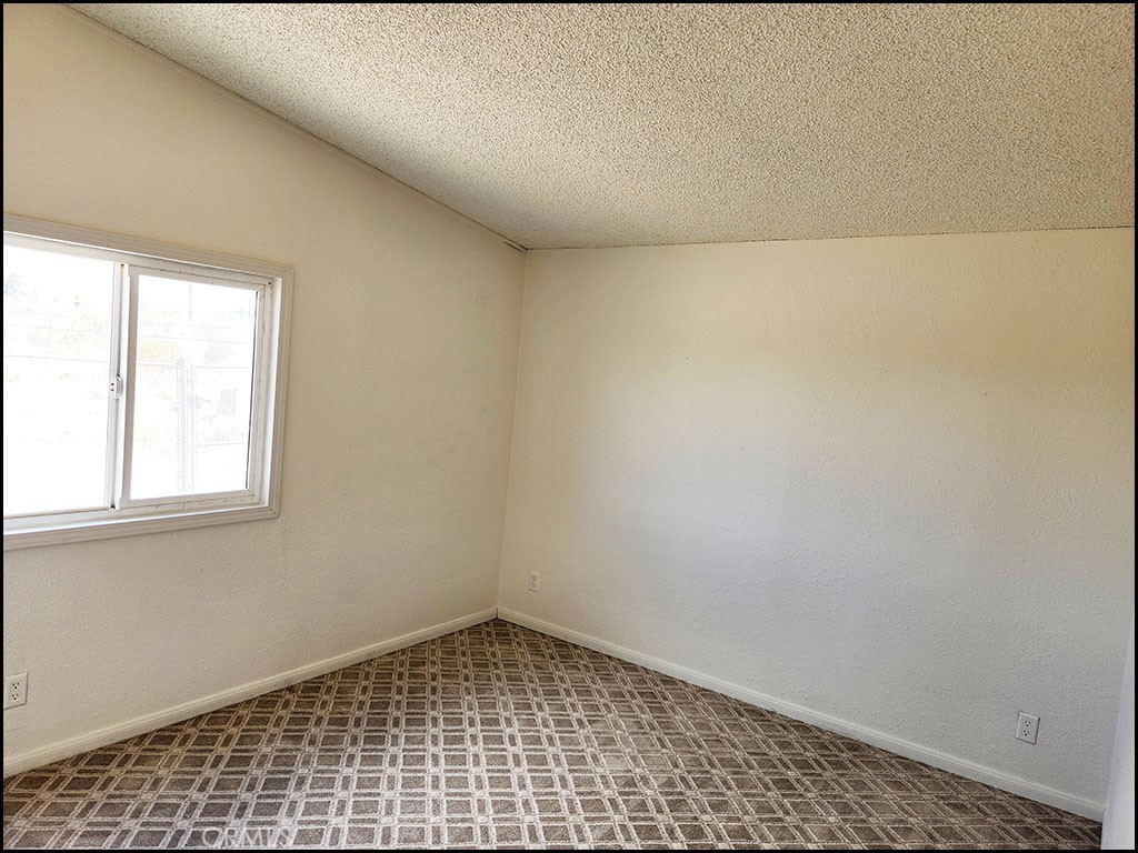 12232 Sheep Creek Road Phelan, CA 92371 - Photo 14 of 45 a view of an empty room