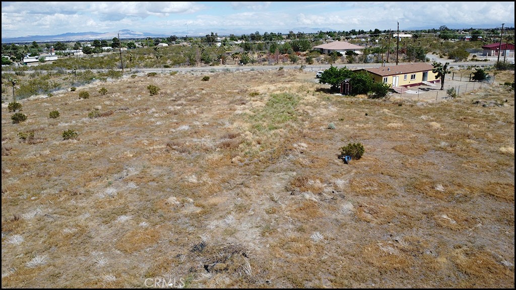 12232 Sheep Creek Road Phelan, CA 92371 - Photo 44 of 45 an aerial view of a houses with a yard