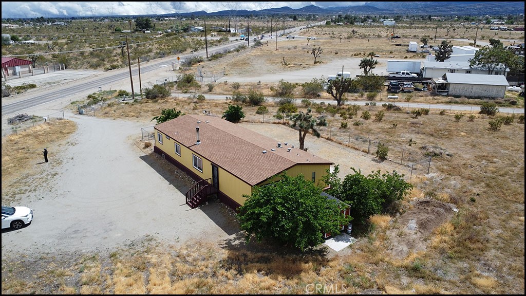 12232 Sheep Creek Road Phelan, CA 92371 - Photo 5 of 45 a view of a houses with a yard
