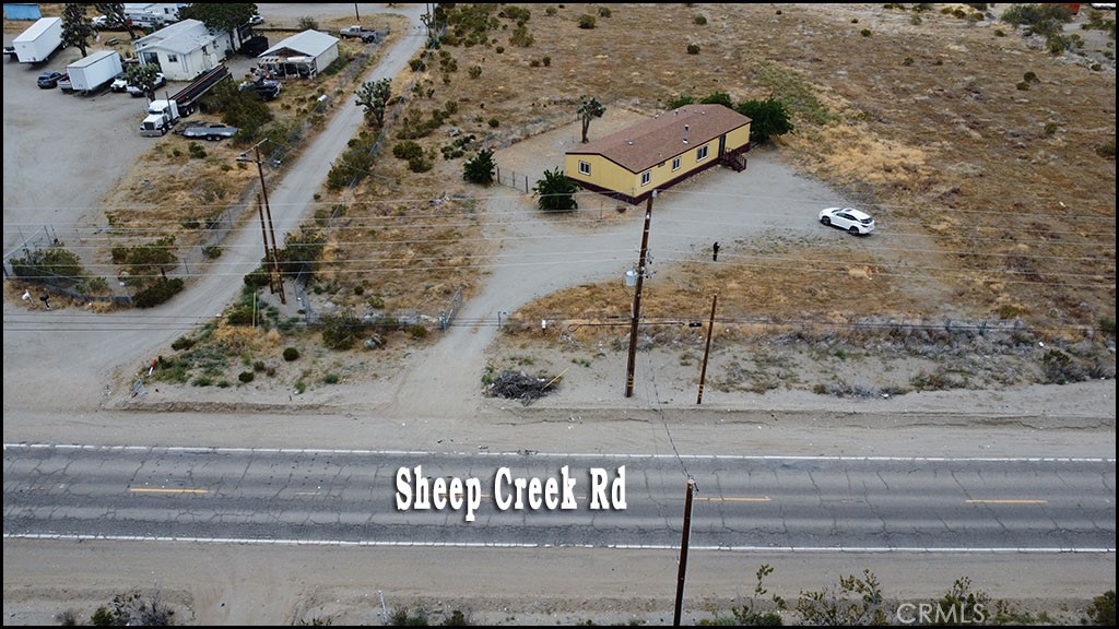 12232 Sheep Creek Road Phelan, CA 92371 - Photo 6 of 45 a view of a street sign