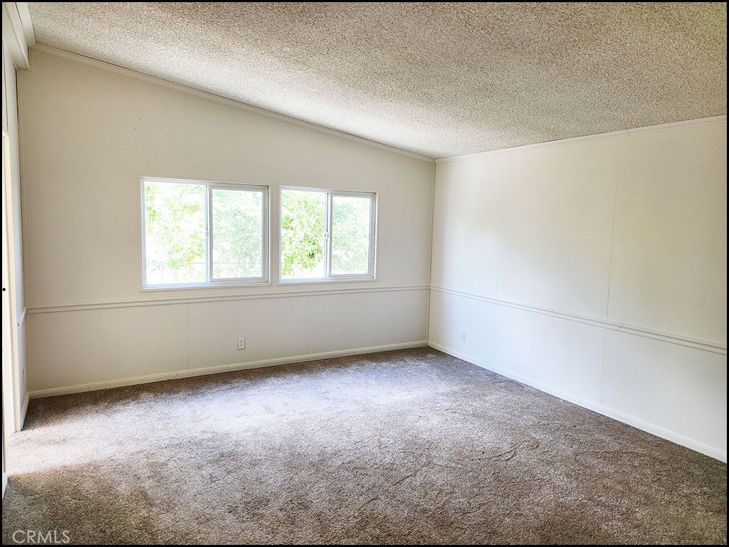 12232 Sheep Creek Road Phelan, CA 92371 - Photo 8 of 45 an empty room with windows
