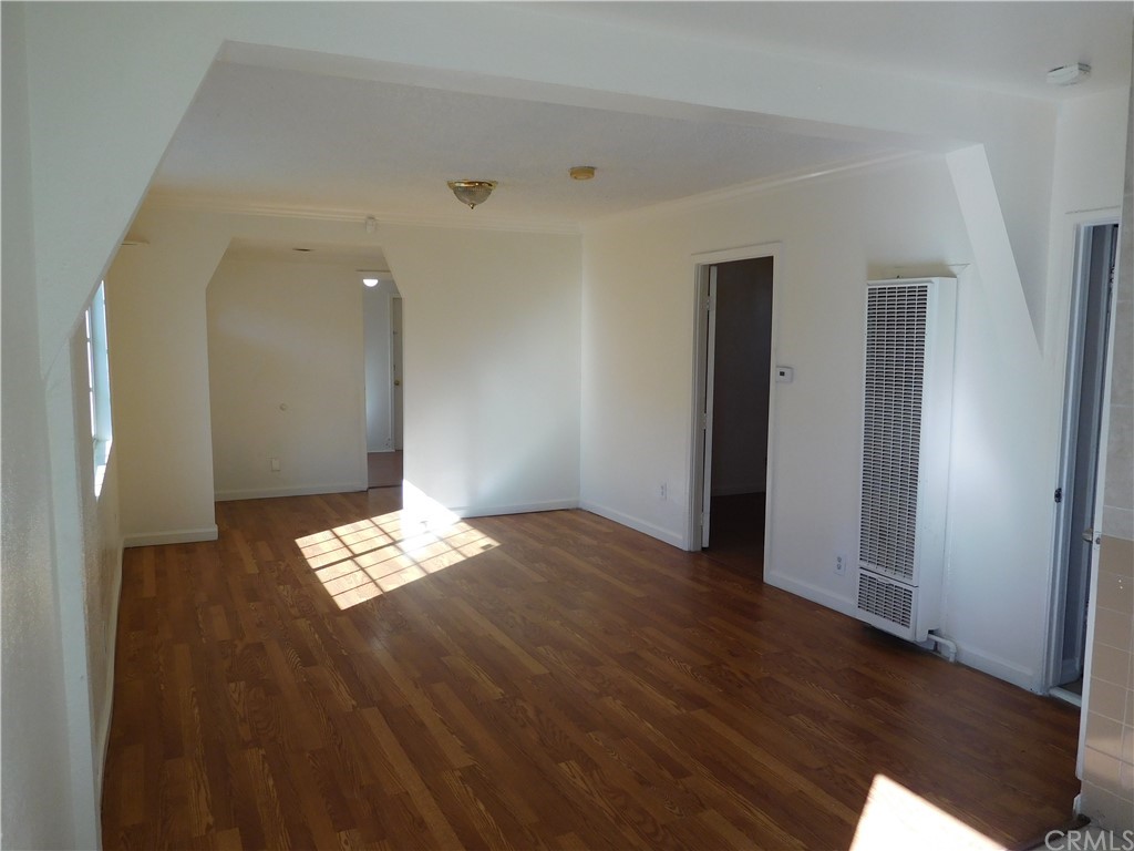 15022 McRae Avenue Norwalk, CA 90650 - Photo 11 of 28 a view of empty room with wooden floor