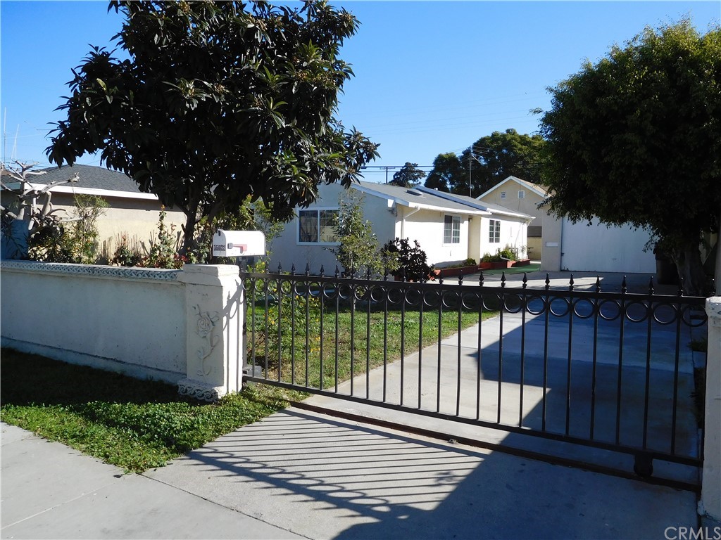 15022 McRae Avenue Norwalk, CA 90650 - Photo 3 of 28 a view of a house with a balcony