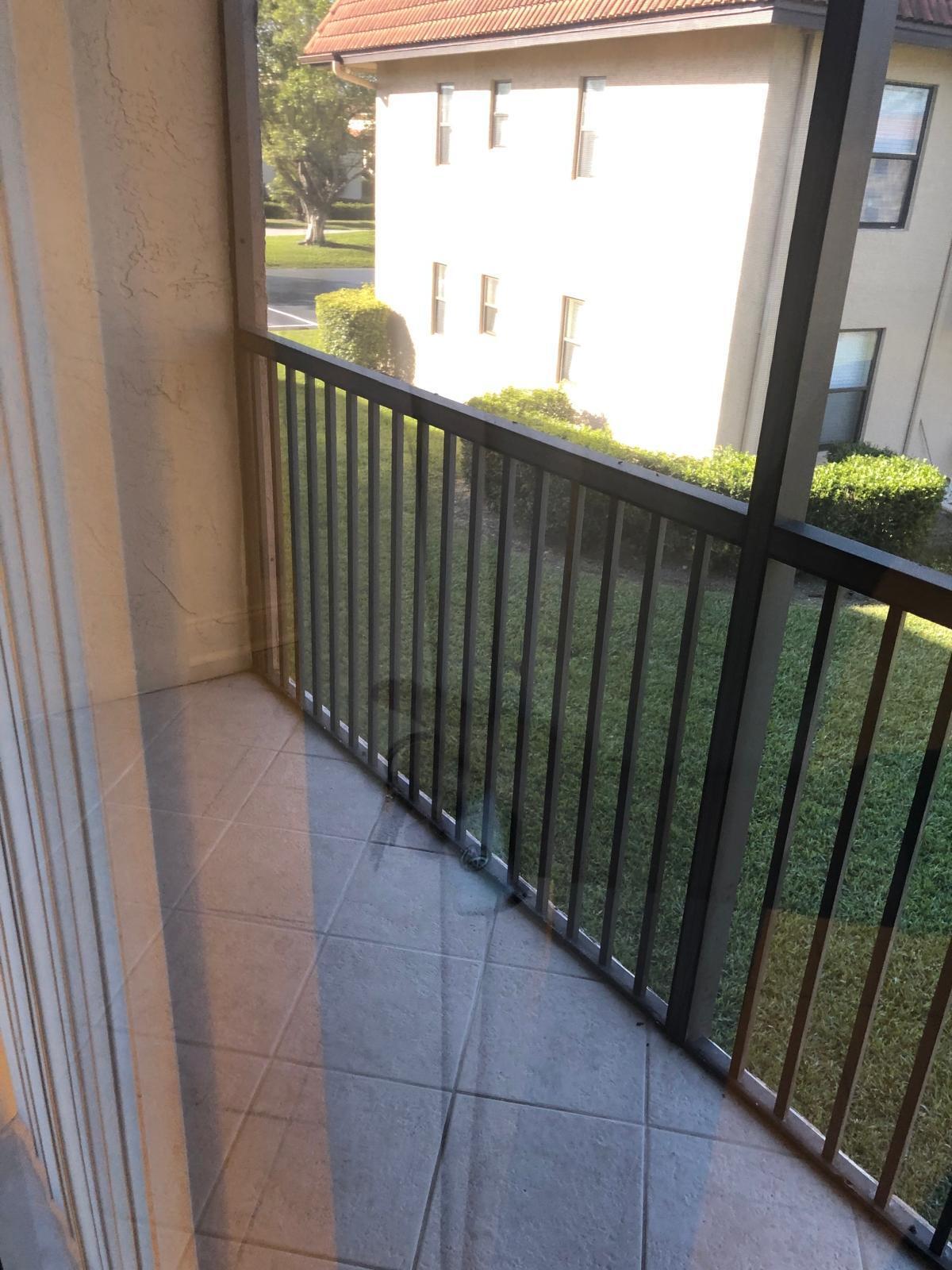 21911 Lake Forest Circle, Unit 204 Boca Raton, FL 33433 - Photo 14 of 16 a view of a porch