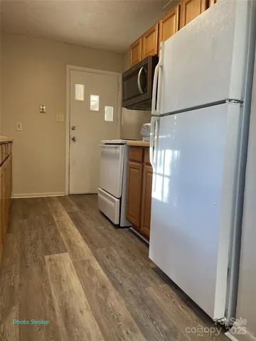 a view of a storage & utility room with washer and dryer