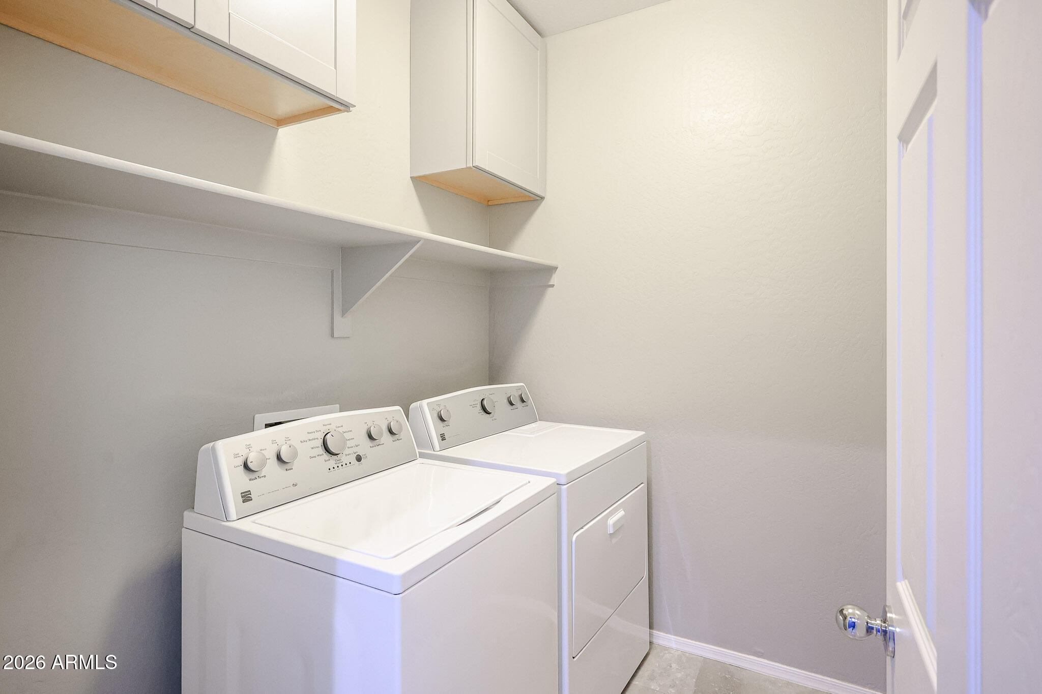 11967 West Rio Vista Lane Avondale, AZ 85323 - Photo 22 of 28 a utility room with dryer and washer