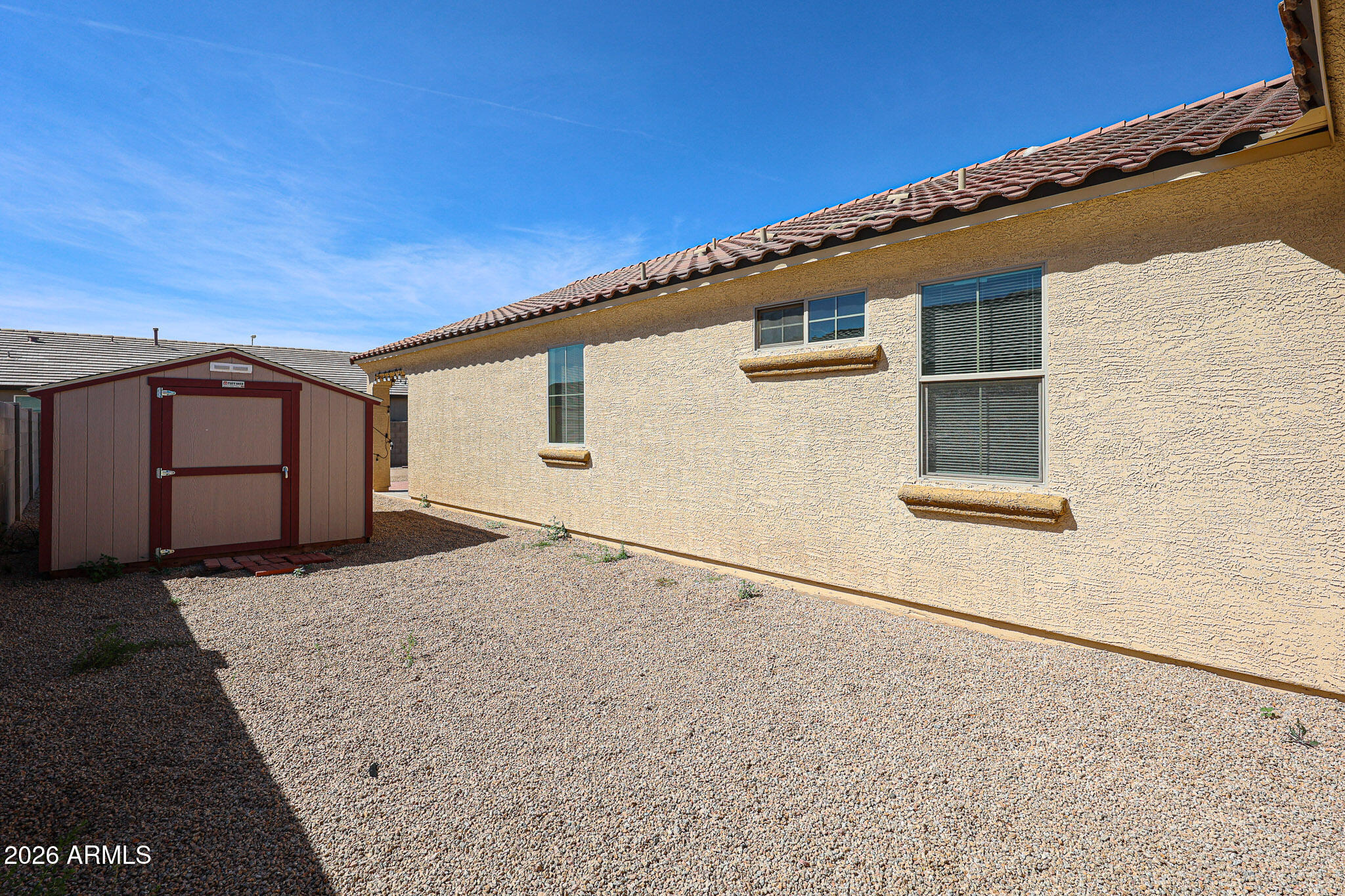 11967 West Rio Vista Lane Avondale, AZ 85323 - Photo 24 of 28 a backyard of a house