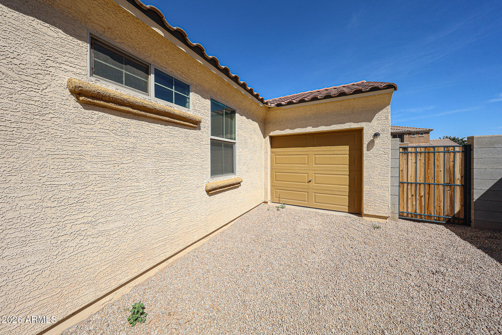 11967 West Rio Vista Lane Avondale, AZ 85323 - Photo 25 of 28 a view of house with garage