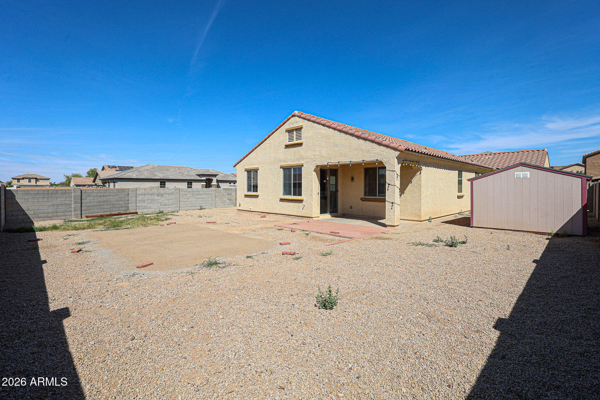11967 West Rio Vista Lane Avondale, AZ 85323 - Photo 26 of 28 a view of a white house with a view of roof