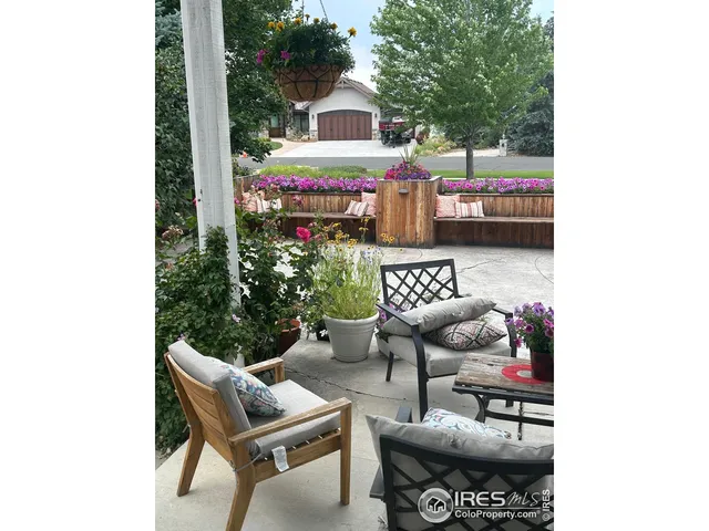 a terrace of a house with outdoor seating