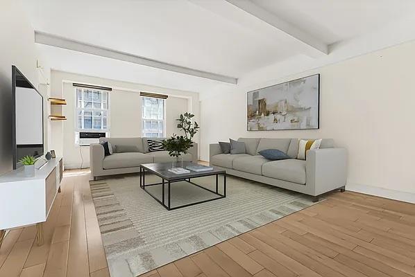 333 West 56th Street, Unit 2N Manhattan, NY 10019 - Photo 2 of 8 a living room with furniture and a flat screen tv