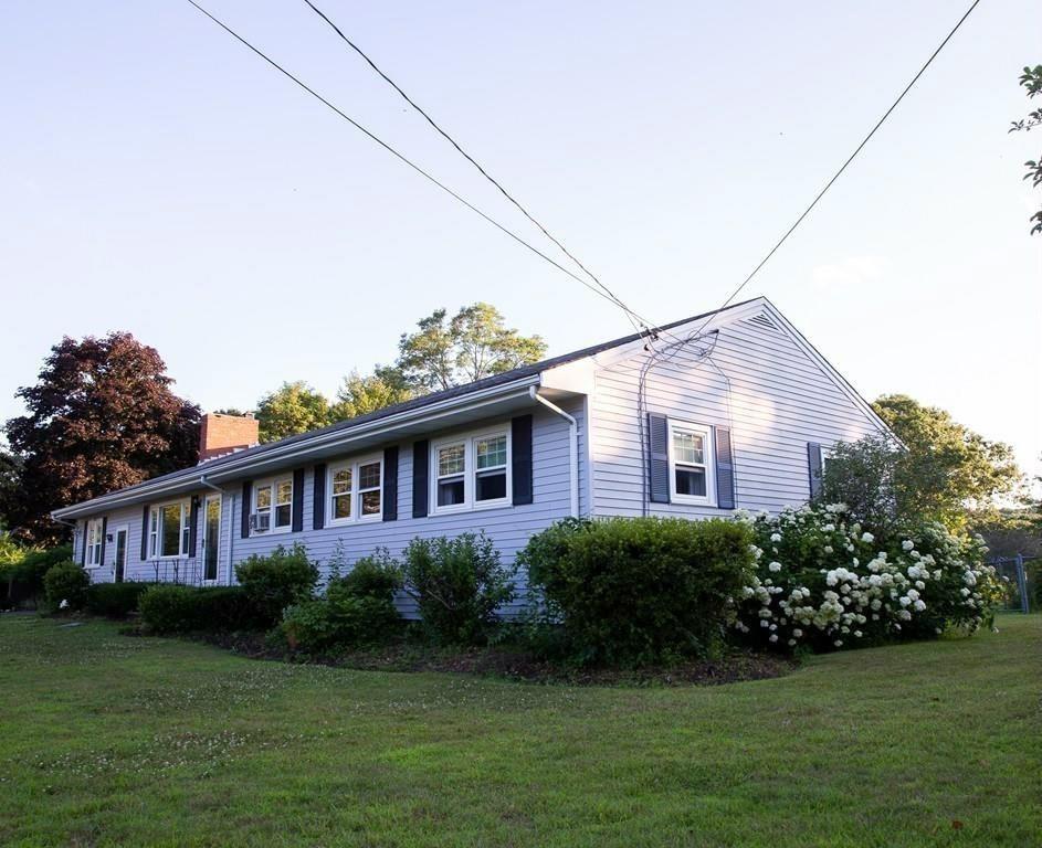 1319 Bay Road Sharon, MA 02067 - Photo 1 of 19 a front view of a house with garden