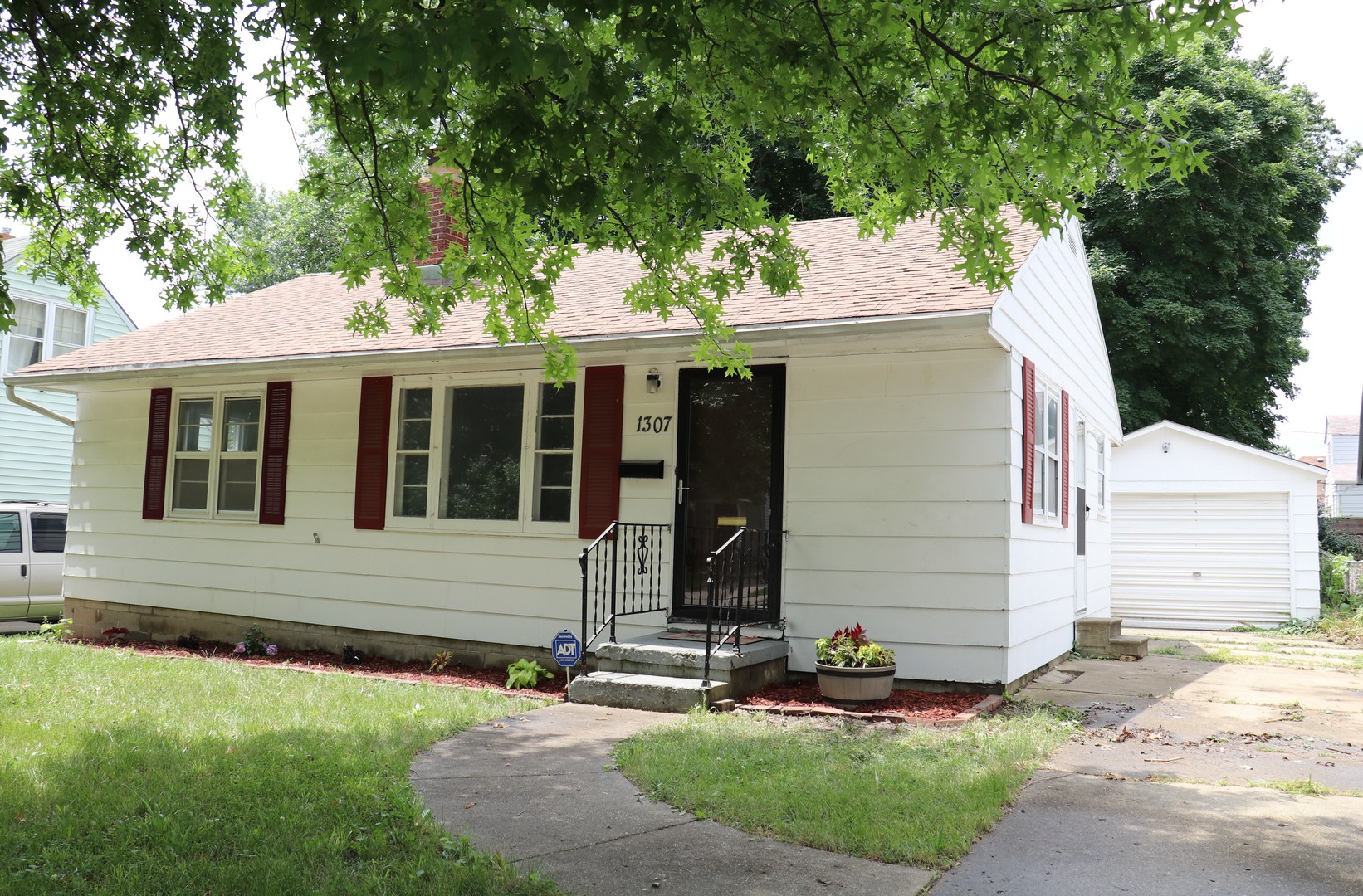 1307 South Jasper Street Decatur, IL 62521 - Photo 3 of 16 a front view of a house with yard and green space