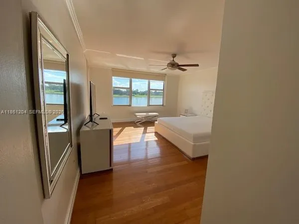 a view of a room that has a large window