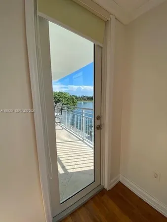 a bathroom with a sink toilet vanity and shower