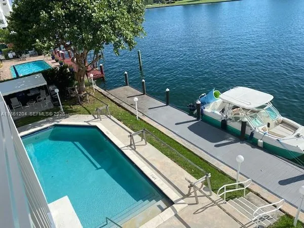 a view of a balcony with chairs