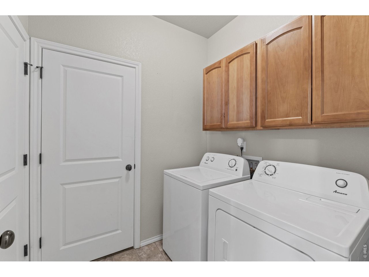 6911 West 3rd Street, Unit 810 Greeley, CO 80634 - Photo 11 of 28 a utility room with dryer and washer