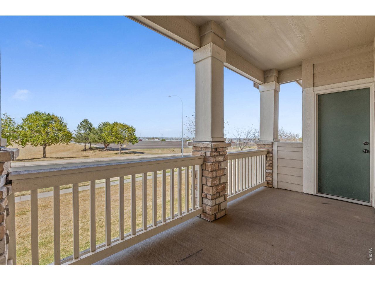 6911 West 3rd Street, Unit 810 Greeley, CO 80634 - Photo 20 of 28 a view of a balcony with an outdoor space