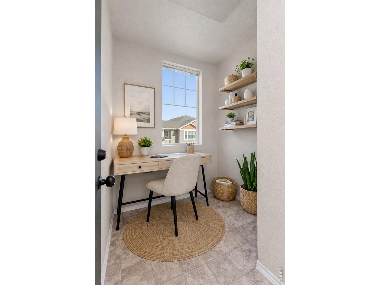6911 West 3rd Street, Unit 810 Greeley, CO 80634 - Photo 21 of 28 a living room with furniture and a potted plant