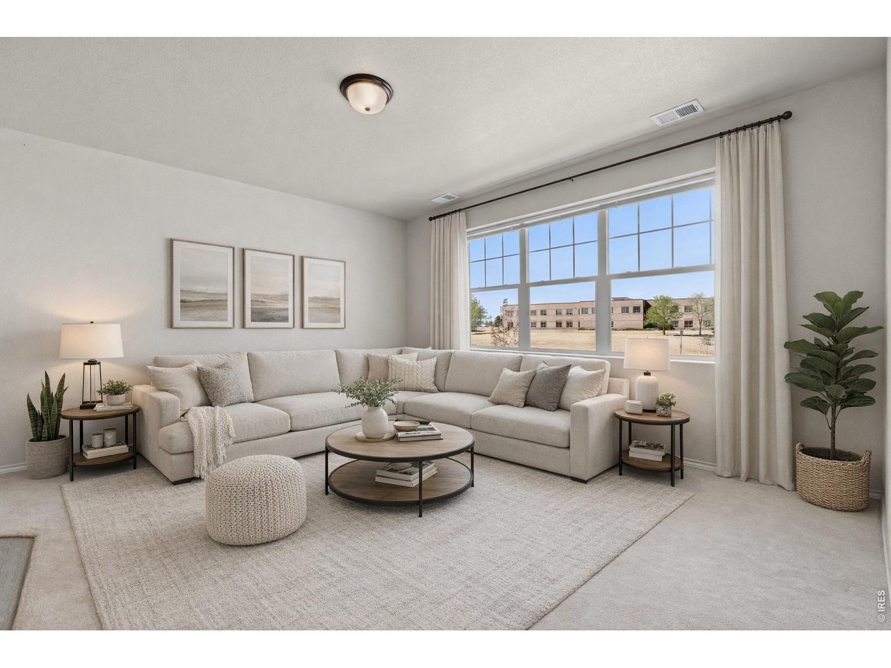 6911 West 3rd Street, Unit 810 Greeley, CO 80634 - Photo 5 of 28 a living room with furniture a chandelier and a window