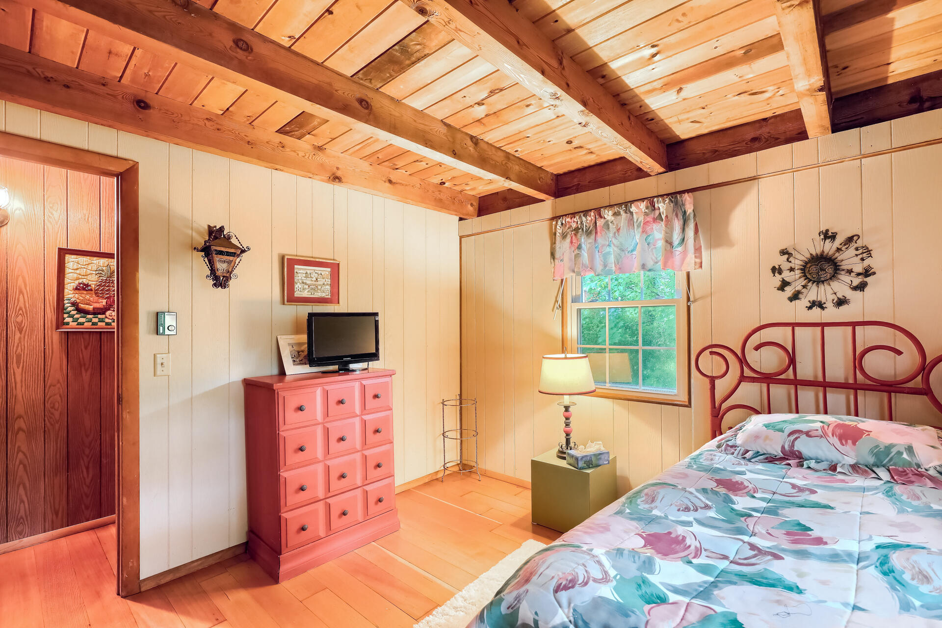 12 Captain Teach Road East Sandwich, MA 02537 - Photo 16 of 24 a bedroom with a bed and a flat tv screen