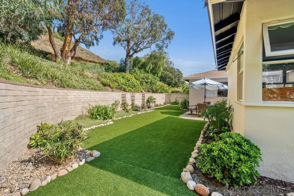 6109 Waverly Avenue La Jolla, CA 92037 - Photo 16 of 23 a view of a garden with plants and large trees