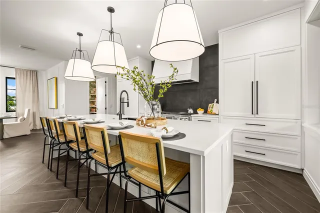 a bedroom with a bed and glass door