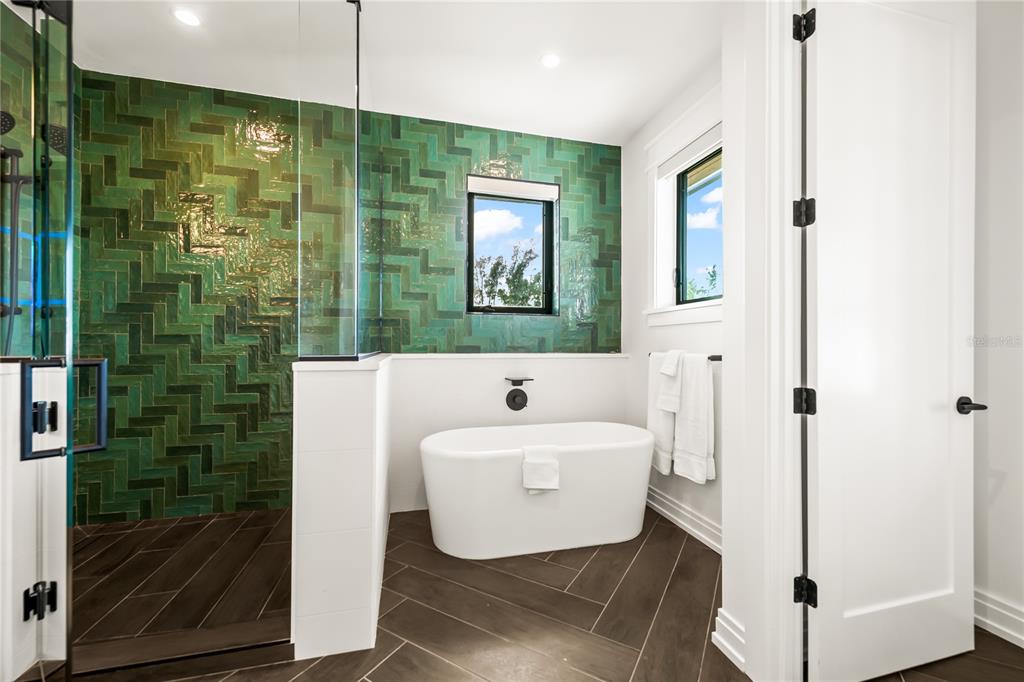 107 Maple Avenue Anna Maria, FL 34216 - Photo 33 of 68 a bathroom with a sink and a mirror