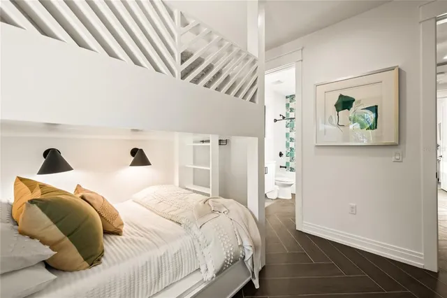 an aerial view of a building with a garden