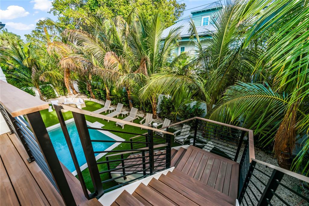 107 Maple Avenue Anna Maria, FL 34216 - Photo 59 of 68 a view of deck with patio and outdoor seating