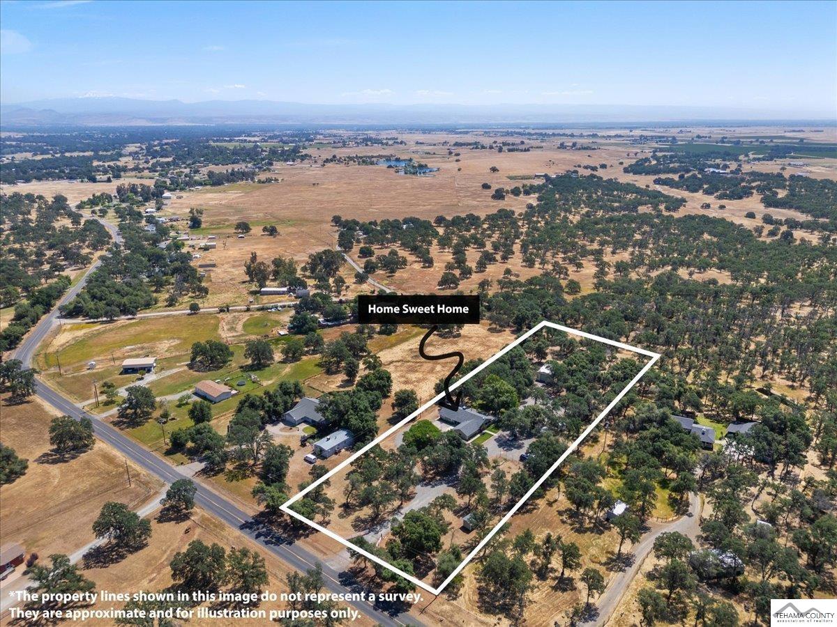 18887 Ridge Road Red Bluff, CA 96080 - Photo 48 of 48 an aerial view of house with yard