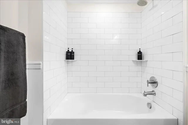 a bathroom with a sink toilet and vanity