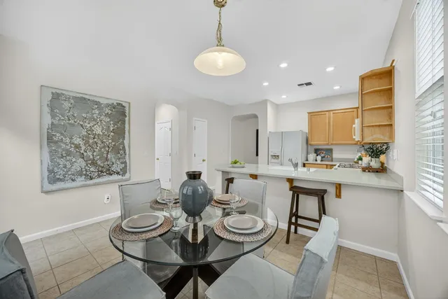 a view of hallway with bathroom