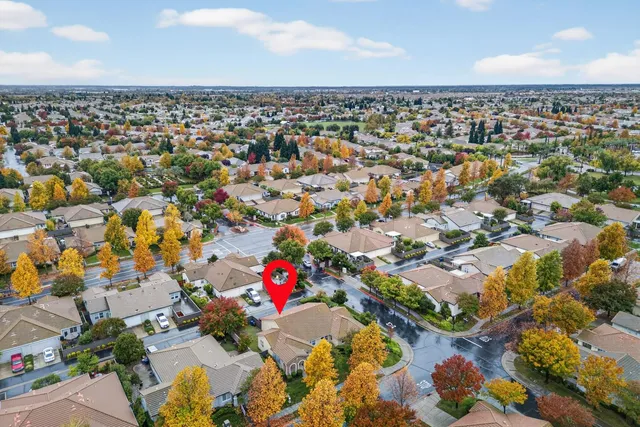 a view of a street with a palm trees