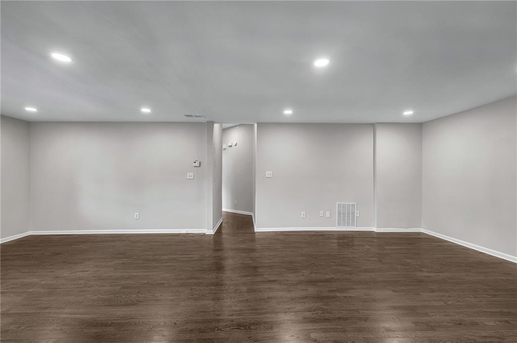 660 Queen Street Southwest, Unit B Atlanta, GA 30310 - Photo 32 of 51 a view of an empty room with wooden floor