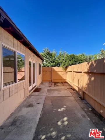 a view of a street with a building in the background