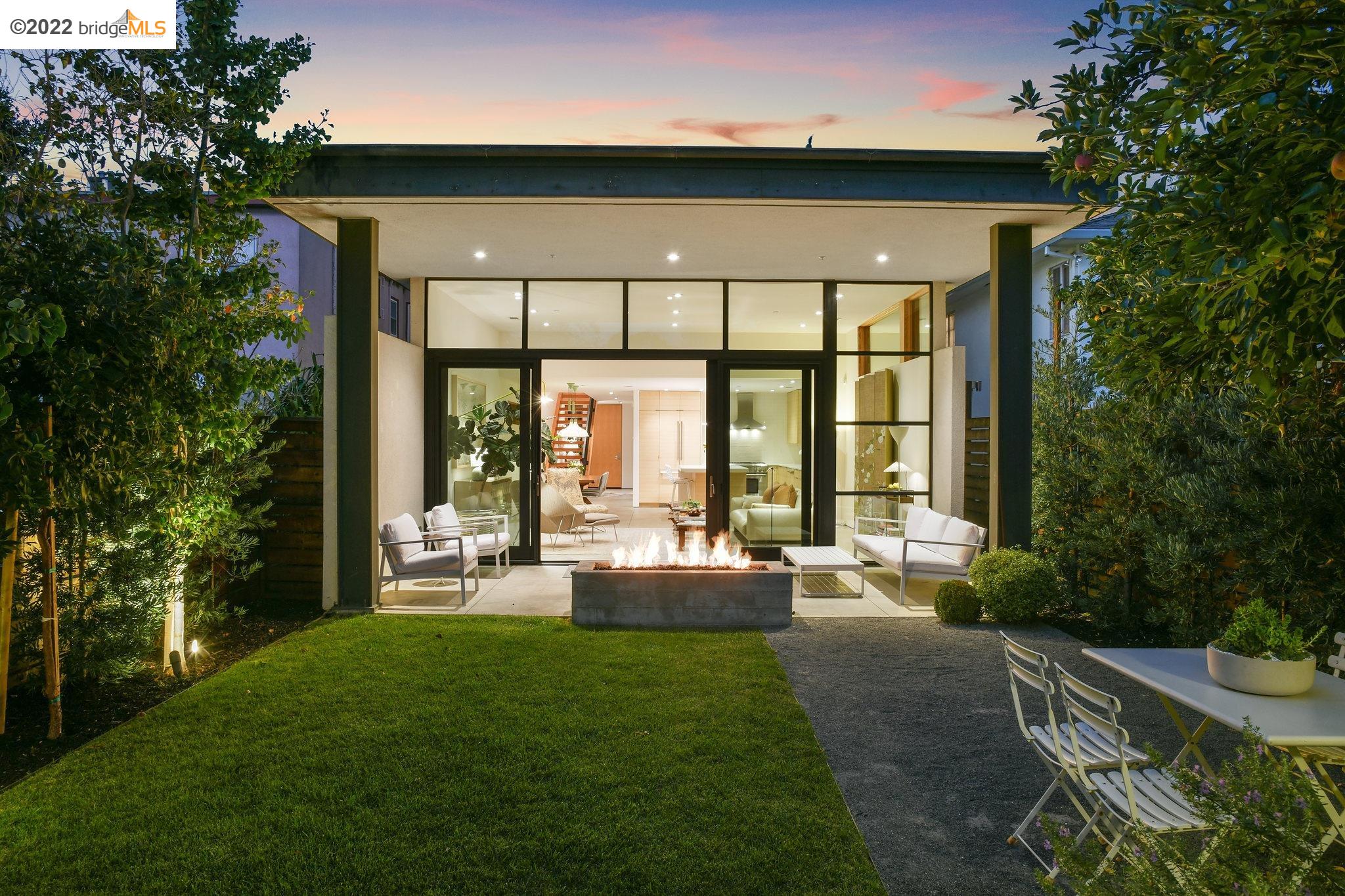 427 Cavour Street Oakland, CA 94618 - Photo 1 of 1 a front view of house with yard outdoor seating and green space