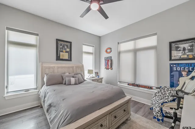 a bedroom with a bed and a couch