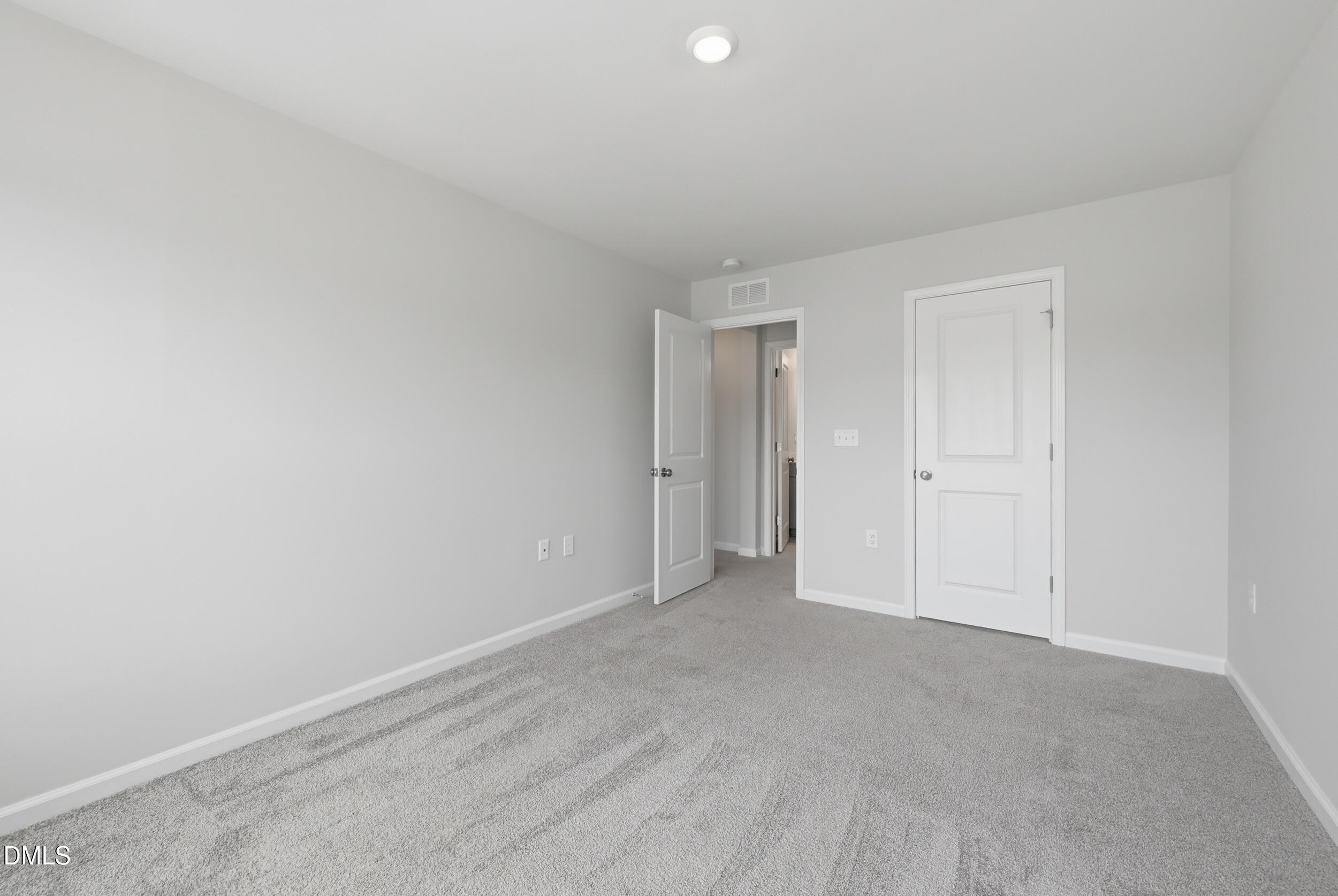 5011 Kota Street Raleigh, NC 27610 - Photo 23 of 42 a view of an empty room and closet area