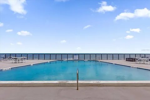 a view of a swimming pool and a terrace