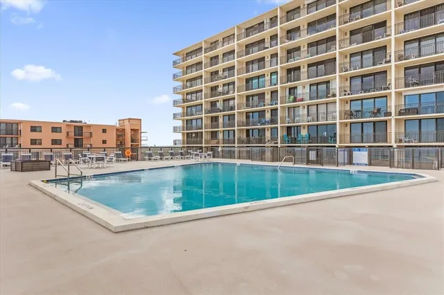 a view of a roof deck with wooden floor