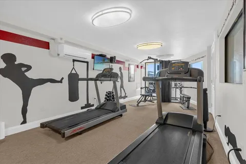 a view of a room with gym equipment