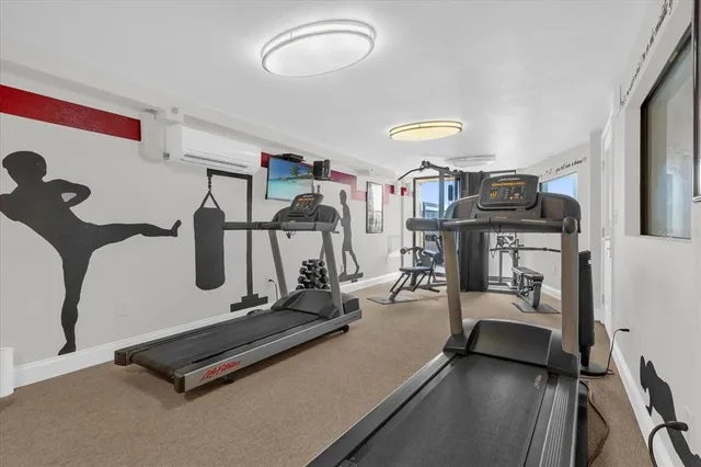 a view of a room with gym equipment