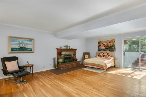 a spacious bedroom with a bed and a couch