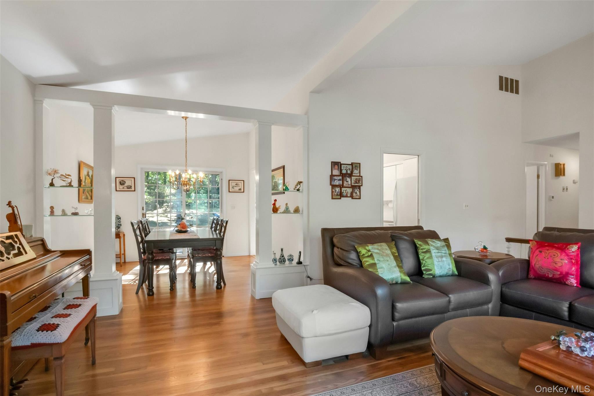 95 Emerson Avenue New Rochelle, NY 10801 - Photo 2 of 27 a living room with furniture and a wooden floor